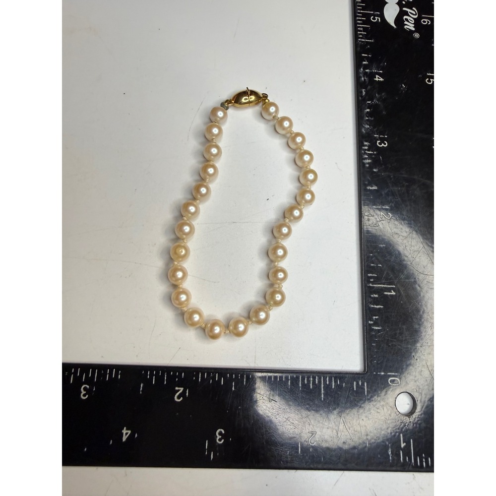 Monet Faux Pearl Bracelet Gold Tone Fold Over Clasp Cream Knotted 7.5 Inch
